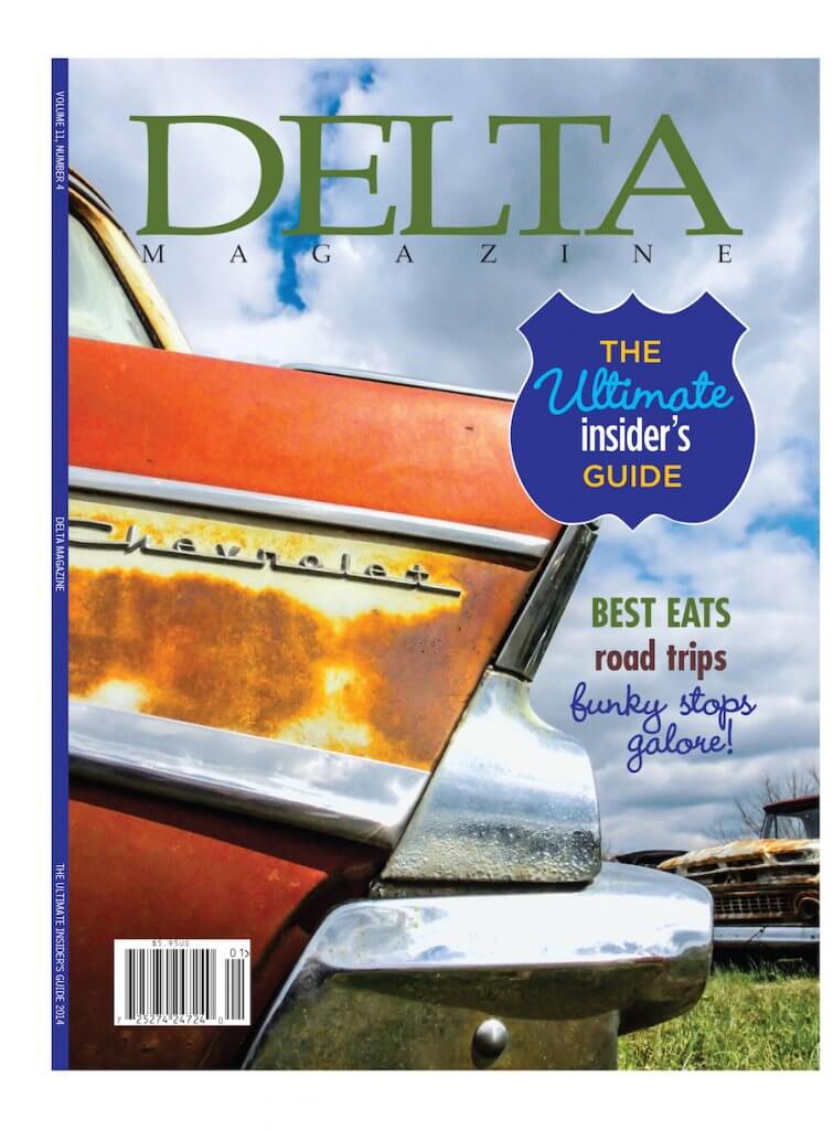 A magazine cover with an old car on the front.